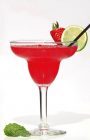 Strawberry Margarita with lime garnish
